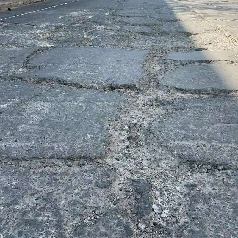 瑞金路面起砂露石子修补料
